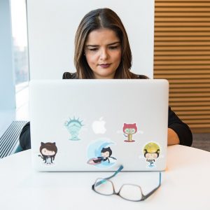 Executive working with a laptop in a modern office