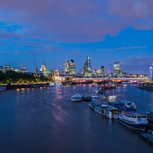 London skyline at dusk seen from Waterloo Bridge